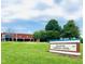 Exterior view of Ballentine Elementary School on a bright, sunny day at 1514 Hinchliff Ct, Fuquay Varina, NC 27526