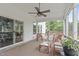 Relaxing screened-in porch with comfortable seating and sliding glass door at 1514 Hinchliff Ct, Fuquay Varina, NC 27526