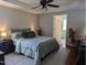 Spacious main bedroom featuring tray ceilings, a ceiling fan, and neutral paint at 154 Hillsdale Dr, Archer Lodge, NC 27527