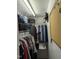 Walk-in closet offering ample storage with shelving and hanging space for clothes and accessories at 154 Hillsdale Dr, Archer Lodge, NC 27527