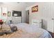 Large bedroom with a television, drawers, and an open doorway at 1709 Whitfield Ave, Rocky Mount, NC 27801