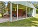A covered brick patio with seating, offering a cozy outdoor living space at 1709 Whitfield Ave, Rocky Mount, NC 27801