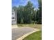View of the backyard of the home with lush greenery and mature trees creating a private and peaceful atmosphere at 1900 Fishamble St # 17, Fuquay Varina, NC 27526