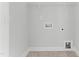 Simple laundry room with tile floors, hookups, and wire shelving ready for appliances at 1900 Fishamble St # 17, Fuquay Varina, NC 27526