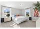 Stylish bedroom featuring natural light, neutral decor, and carpeted floors at 1924 Fishamble # 23, Fuquay Varina, NC 27526
