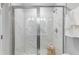 Beautiful tile shower with glass enclosure, providing a luxurious bathing experience at 1924 Fishamble # 23, Fuquay Varina, NC 27526