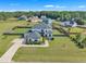 New construction home boasts a large lot, modern farmhouse design, and lush landscaping at 2004 Yamacraw Dr, Knightdale, NC 27545