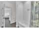 Well-maintained bathroom with an open doorway and shower/tub combination at 2004 Yamacraw Dr, Knightdale, NC 27545