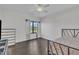 A simple bedroom featuring dark wood floors, a large window and neutral color palette at 2004 Yamacraw Dr, Knightdale, NC 27545