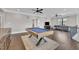 Spacious game room with a pool table, a sofa, and ample lighting at 2004 Yamacraw Dr, Knightdale, NC 27545
