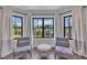 Inviting window nook with seating, natural light, and views of the outdoors at 2004 Yamacraw Dr, Knightdale, NC 27545