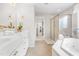 This primary bath offers double vanity, shower and soaking tub for the ultimate relaxation at 203 Worsham Dr., Chapel Hill, NC 27516