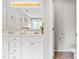 Bright, well-lit bathroom features double sinks and separate toilet room at 203 Worsham Dr., Chapel Hill, NC 27516