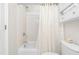 Cozy bathroom features a tiled shower/tub with a white curtain at 203 Worsham Dr., Chapel Hill, NC 27516