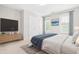 Stylish bedroom featuring soft carpet and updated fixtures at 203 Worsham Dr., Chapel Hill, NC 27516