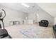 Bright bonus room features carpet and a leather chair at 203 Worsham Dr., Chapel Hill, NC 27516