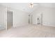 Spacious main bedroom features vaulted ceilings and access to ensuite bathroom and walk-in closet at 203 Worsham Dr., Chapel Hill, NC 27516