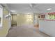 Open living space with view to washer/dryer, back entrance and entry to another room with a bedroom at 205 W Oak Ave, Wake Forest, NC 27587
