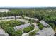 Areal view showcasing a beautiful community nestled within a dense forest at 2082 Weston Green Loop Loop, Cary, NC 27513