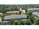 Areal view showcasing a townhouse community with lush green landscaping at 2082 Weston Green Loop Loop, Cary, NC 27513