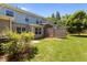 A backyard with a privacy fence and a lush green lawn at 2082 Weston Green Loop Loop, Cary, NC 27513