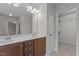 Bathroom features double sink vanity with modern fixtures and a walk-in closet at 2082 Weston Green Loop Loop, Cary, NC 27513