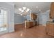 Spacious kitchen area with updated countertops, stainless steel appliances, and eat-in area at 2082 Weston Green Loop Loop, Cary, NC 27513