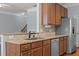 Kitchen featuring granite countertops, stainless appliances, and an undermount sink at 2082 Weston Green Loop Loop, Cary, NC 27513