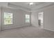 Spacious main bedroom features a ceiling fan and adjoining bathroom at 2082 Weston Green Loop Loop, Cary, NC 27513