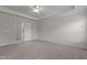 Spacious main bedroom with neutral carpeting and easy access to bath and laundry at 2082 Weston Green Loop Loop, Cary, NC 27513