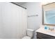 Bright bathroom features a vanity and a shower-tub combo at 228 Shingle Oak Rd, Wake Forest, NC 27587
