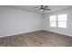 Bright bedroom features hardwood floors and lots of natural light at 228 Shingle Oak Rd, Wake Forest, NC 27587