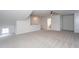 Large carpeted bedroom with multiple windows and a ceiling fan at 228 Shingle Oak Rd, Wake Forest, NC 27587