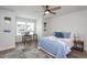 Bright bedroom with stylish decor, a desk by the window, and ample natural light at 228 Shingle Oak Rd, Wake Forest, NC 27587