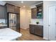 Modern kitchen featuring stainless steel appliances, stylish cabinetry, and a bright marble countertop at 228 Shingle Oak Rd, Wake Forest, NC 27587