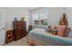 Comfortable bedroom featuring carpet and a window at 24 W Catalina Ct, Clayton, NC 27527