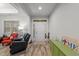 Welcoming entryway features wood flooring, neutral tones, with a view of the adjoining rooms at 24 W Catalina Ct, Clayton, NC 27527
