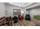 Comfortable living room boasts a coffered ceiling, bright natural light and features inviting seating at 24 W Catalina Ct, Clayton, NC 27527