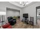 Inviting living space shows coffered ceiling, wood floors, comfortable seating, and a bright, airy feel at 24 W Catalina Ct, Clayton, NC 27527