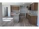 Modern kitchen with stainless steel appliances, granite countertops, and ample cabinet space at 240 Eason Creek Way, Clayton, NC 27527
