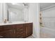 Bathroom featuring a double sink vanity and a shower and tub combo at 241 Fishburn Dr, Apex, NC 27523