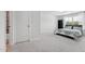 Bedroom boasts a bed and pillows, closet door, and a window with light-filtering shades at 241 Fishburn Dr, Apex, NC 27523