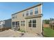 Back exterior of home with patio at 241 Fishburn Dr, Apex, NC 27523