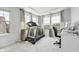 Bright room features a treadmill and office area, and is well lit by natural light at 241 Fishburn Dr, Apex, NC 27523