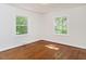 Bedroom with wood floors and neutral paint and good natural light at 2434 Morningside Dr, Burlington, NC 27217