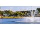 Picturesque park featuring a pond, fountain, playground, picnic shelters, and recreational facilities at 253 Hank Way, Angier, NC 27501