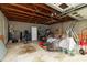 Spacious garage interior, great for storage or workshop, with exposed ceiling beams at 2646 Laurel Mill-Centerville Rd, Louisburg, NC 27549