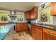 Well-appointed kitchen with stainless steel appliances, granite countertops, and custom cabinetry at 2646 Laurel Mill-Centerville Rd, Louisburg, NC 27549