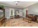 Inviting living room with hardwood floors, a comfortable sofa, and an inviting seating arrangement at 2646 Laurel Mill-Centerville Rd, Louisburg, NC 27549