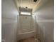 Bathroom with a shower and tub combination, designed for relaxation and functionality at 2760 Rains Mill Rd, Princeton, NC 27569